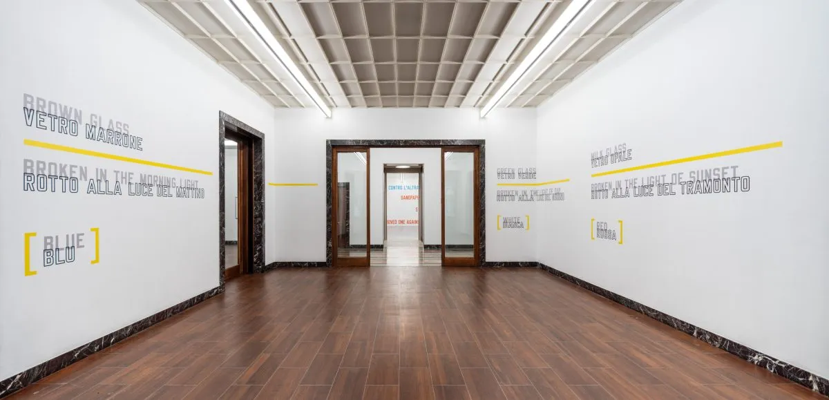 Installation view of Lawrence Weiner: & Una certa massa alla base di tutto | & Determined mass at the base of it all