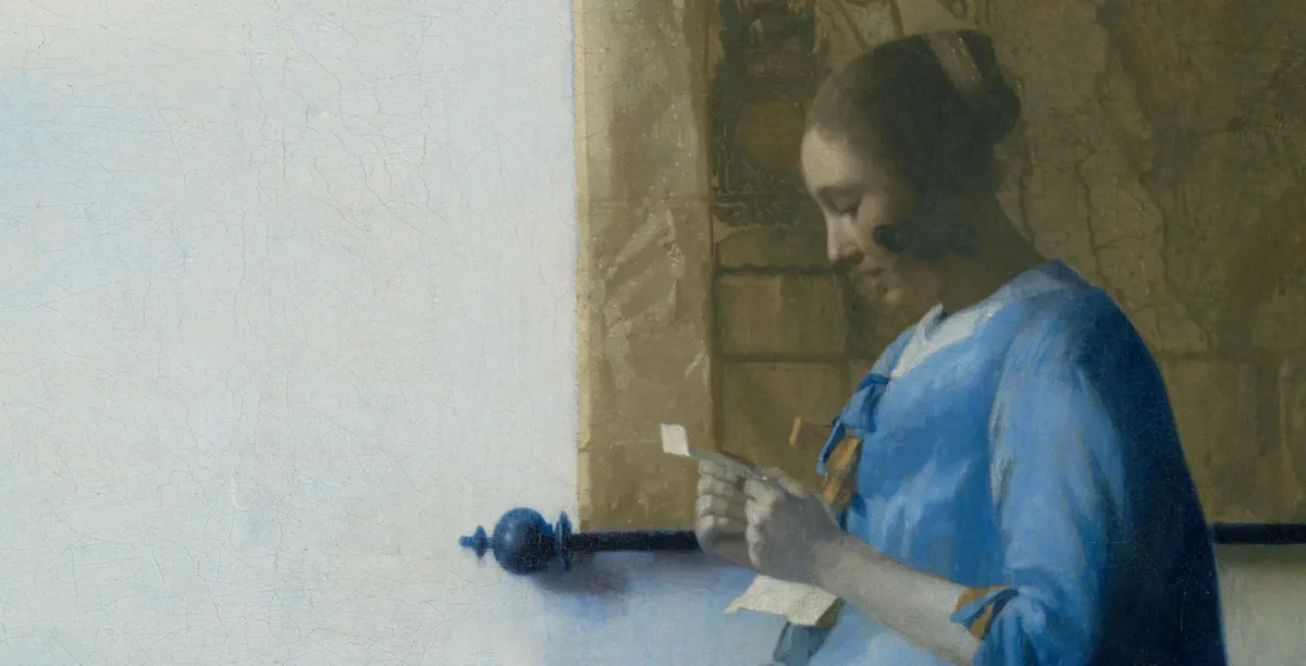 Woman in Blue Reading a Letter