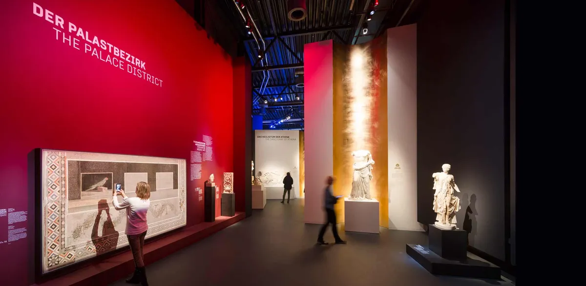 Installation view of PERGAMON: Masterpieces from the Ancient Metropolis with a 360° Panorama by Yadegar Asisi