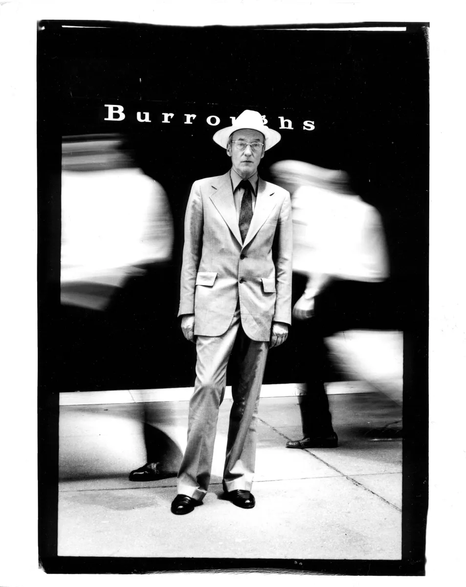 William Burroughs in front of the Burroughs Corporation headquarters NY, 1975